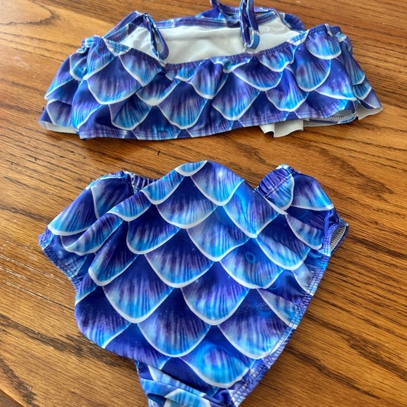 Girls Bathing Suits Set of 7
Size 6-8 - Picture 15 of 15